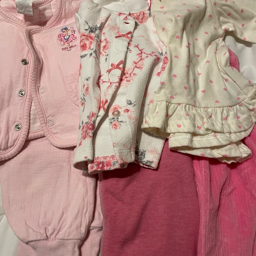 3 pink outfit sets